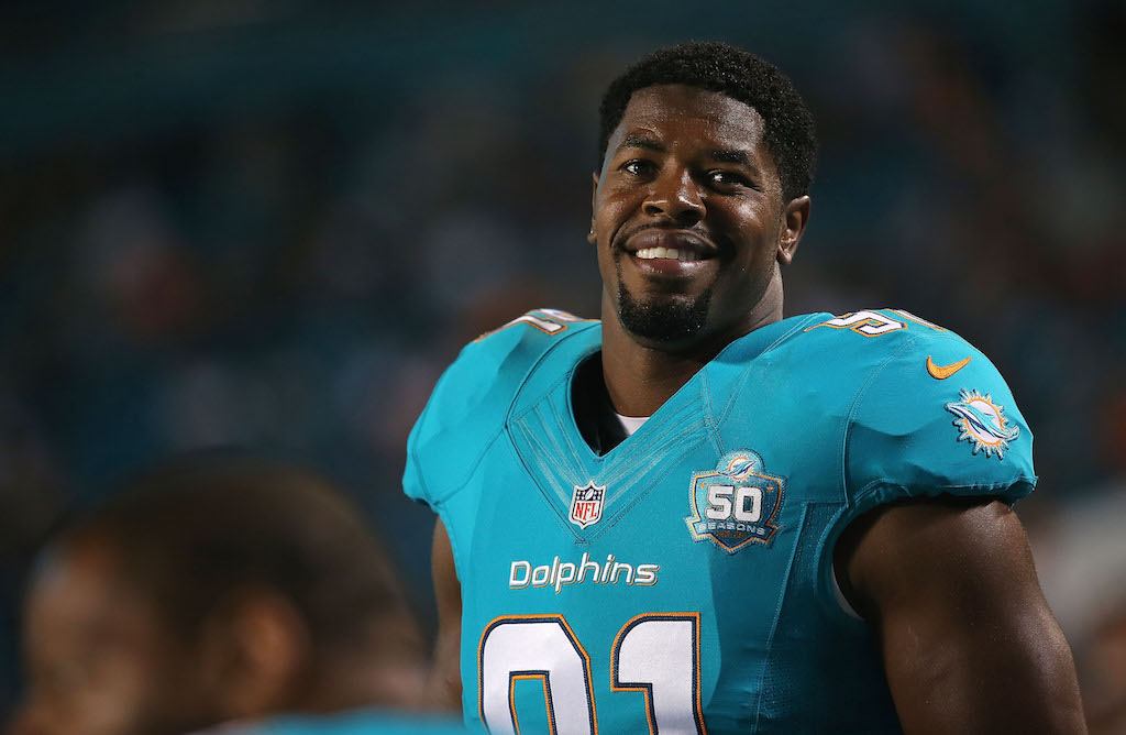 Cameron Wake of the Miami Dolphins looks on during a preseason game.