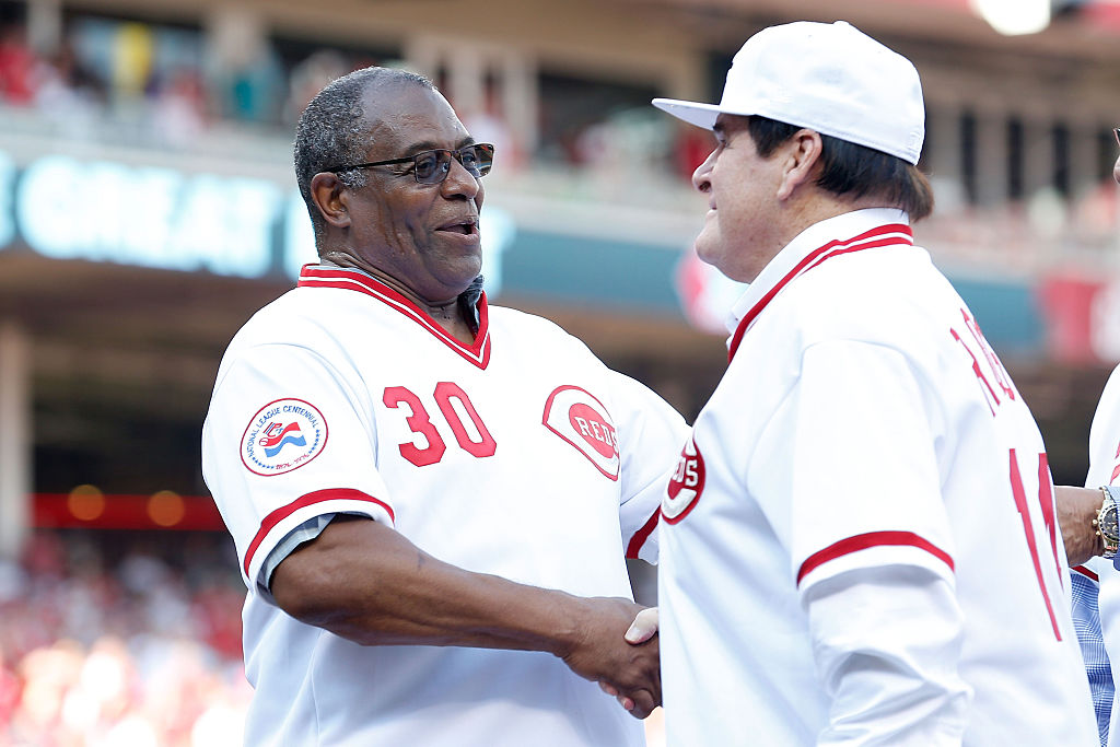 Cincinnati Reds greats Ken Griffey and Pete Rose shake hands during a ceremony honoring the 1976 World Series Championship 