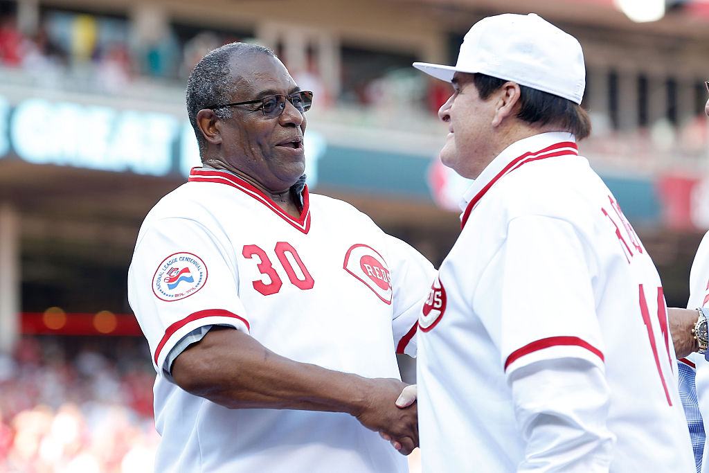 Cincinnati Reds greats Ken Griffey and Pete Rose shake hands during a ceremony honoring the 1976 World Series Championship