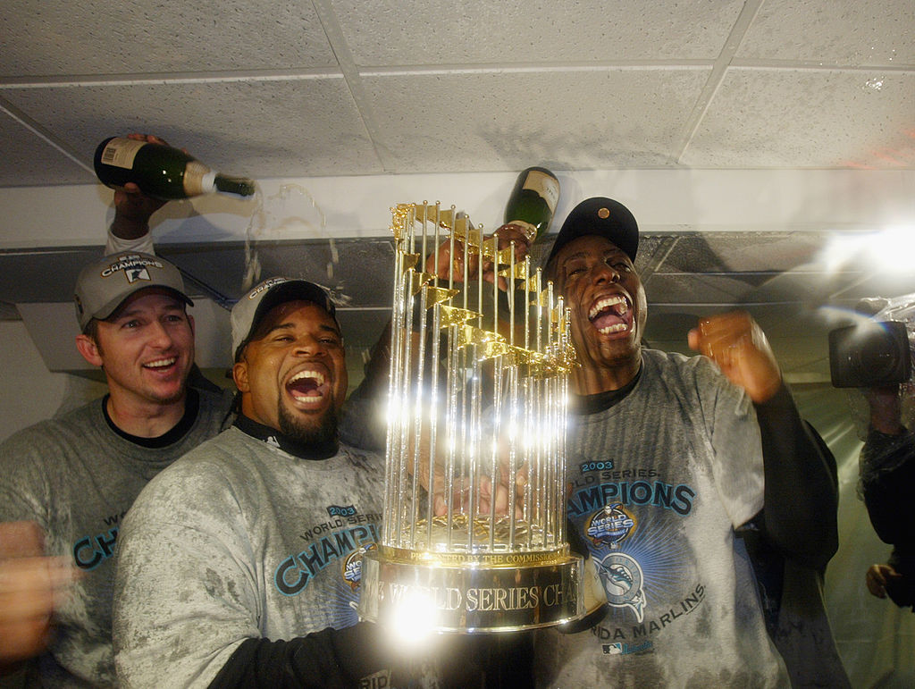 Florida Marlins players celebrate with the World Series Trophy after defeating the New York Yankees in game six of the Major League Baseball World Series on October 25, 2003 at Yankee Stadium in the Bronx, New York. The Marlins won 2-0. Florida Marlins players celebrate with the World Series Trophy after defeating the New York Yankees in game six of the Major League Baseball World Series on October 25, 2003 at Yankee Stadium in the Bronx, New York. The Marlins won 2-0.