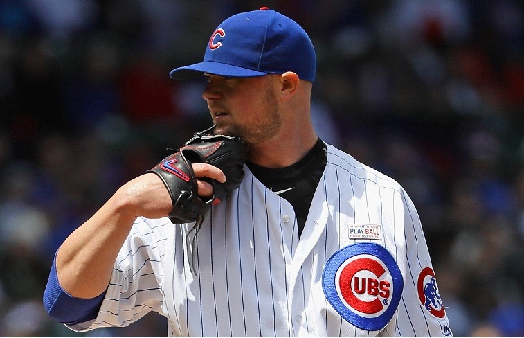 CHICAGO, IL - MAY 15: Starting pitcher Jon Lester #34 of the Chicago Cubs looks for the signals against the Pittsburgh Pirates at Wrigley Field on May 15, 2016 in Chicago, Illinois. (Photo by Jonathan Daniel/Getty Images)