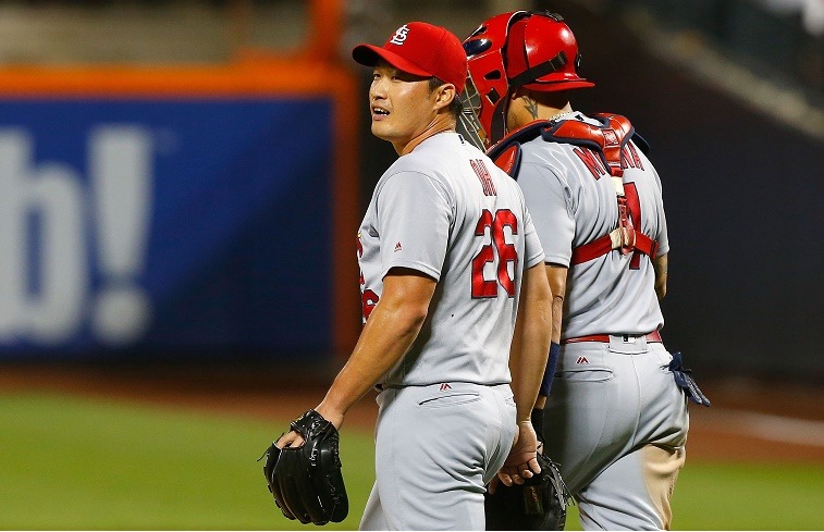 NEW YORK, NY - JULY 27: Seung Hwan Oh #26 and Yadier Molina #4 of the St. Louis Cardinals celebrate after defeating the New York Mets at Citi Field on July 27, 2016 in the Flushing neighborhood of the Queens borough of New York City.