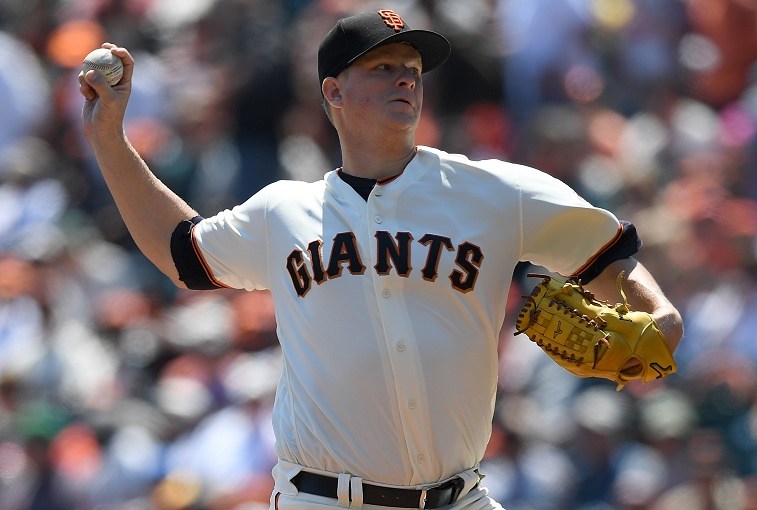Matt Cain of the San Francisco Giants pitches against the Pittsburgh Pirates.