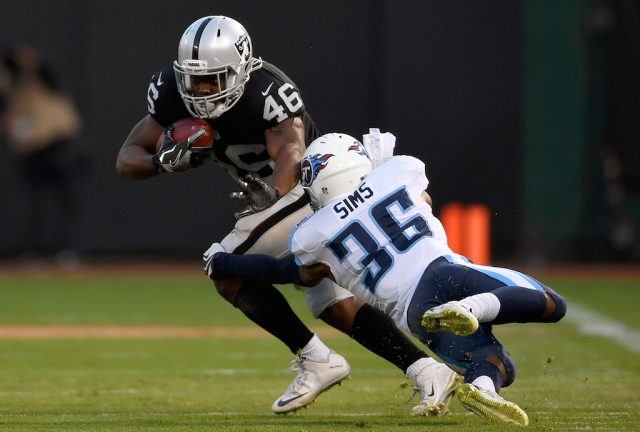 Jalen Richard (L) shows you how to break a the tackle | Thearon W. Henderson/Getty Images