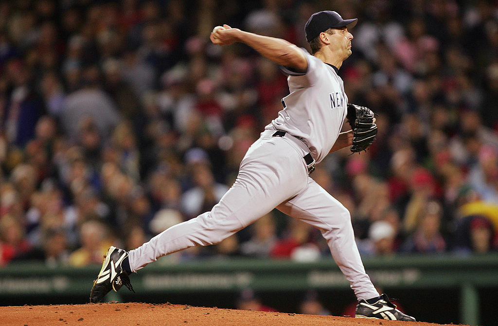 BOSTON - OCTOBER 16: Pitcher Kevin Brown #27 of the New York Yankees throws a pitch against the Boston Red Sox in the first inning during game three of the American League Championship Series on October 16, 2004 at Fenway Park in Boston, Massachusetts. (Photo by Ezra Shaw/Getty Images)