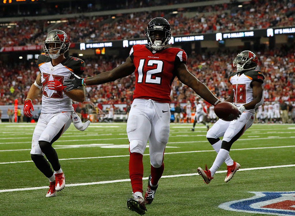 Mohamed Sanu of the Atlanta Falcons scores a two-point conversion.