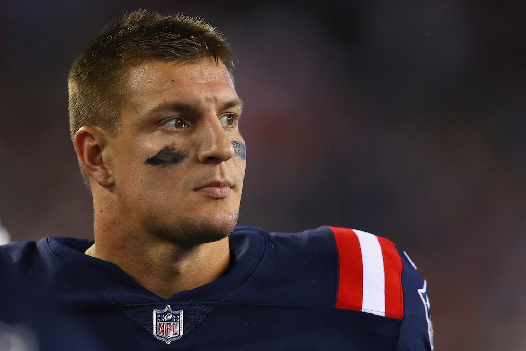 Rob Gronkowski stands on the sidelines.