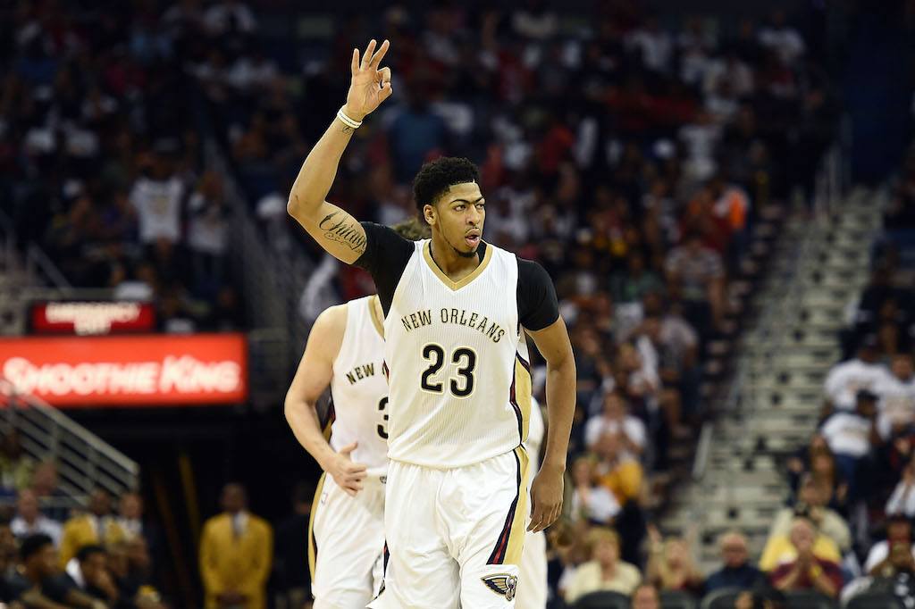 Anthony Davis signals to his New Orleans teammates.