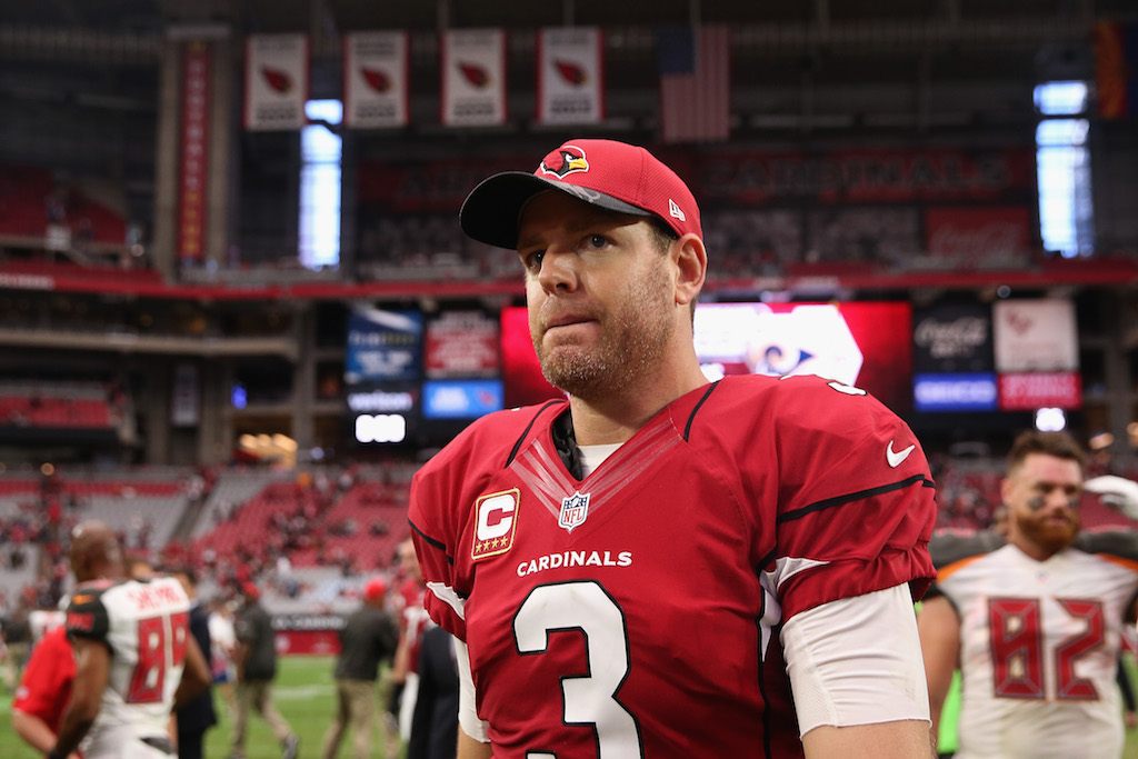 Carson Palmer leaves the field after a game in 2016.