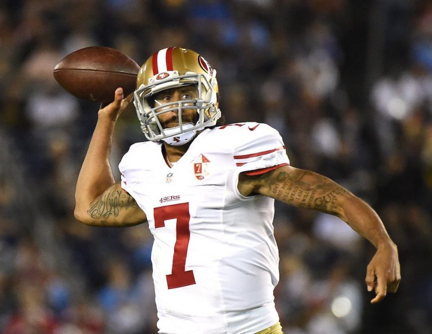Colin Kaepernick does work in the preseason | Harry How/Getty Images