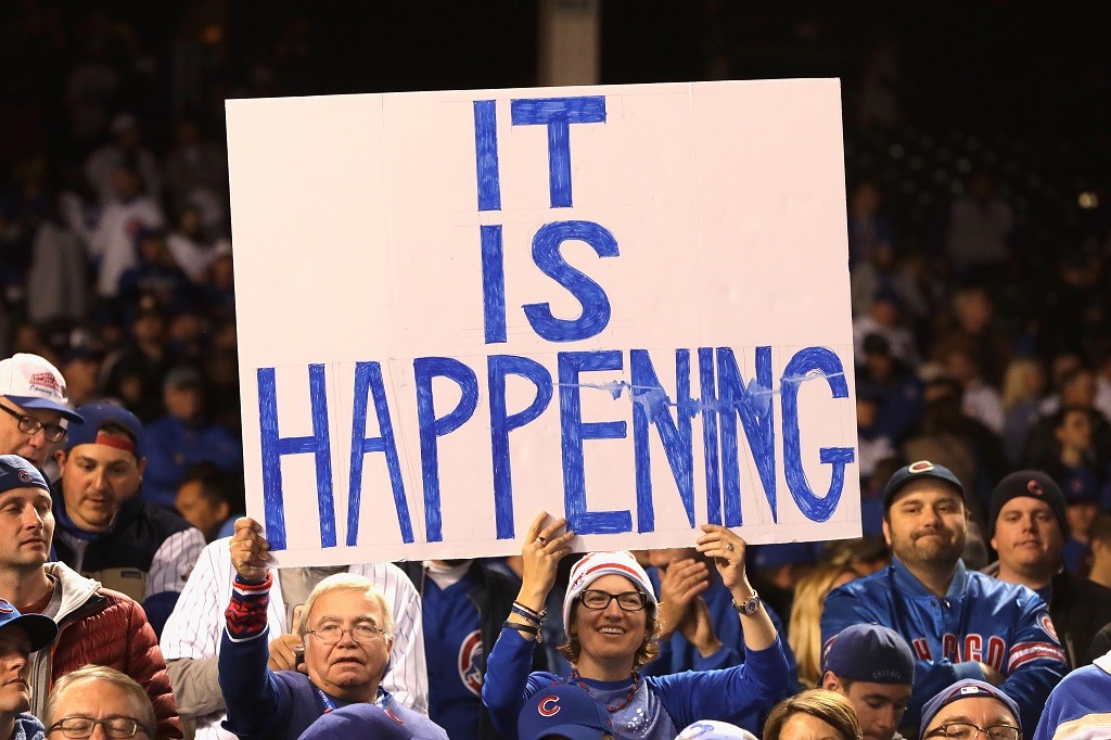 Cubs fans hold a sign after the Chicago Cubs defeated the Los Angeles Dodgers in the 2016 National League Championship Series.