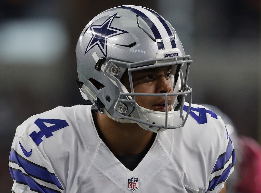 Dak Prescott #4 of the Dallas Cowboys prepares for a play.