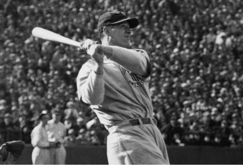 circa 1930: Baseball star Lou Gehrig (1903 - 1941) at the moment of his home-run hit at his game between Major League and All Japan.