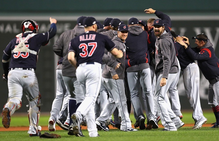 The Cleveland Indians celebrate defeating the Boston Red Sox 4-3 in game three of the American League Divison Series to advance to the American League Championship Series at Fenway Park on October 10, 2016 in Boston, Massachusetts.