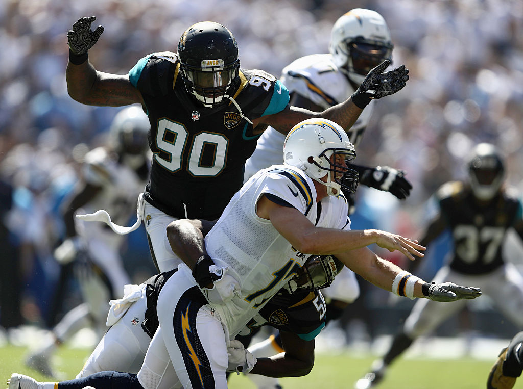 Malik Jackson #90 and Dante Fowler #56 of the Jacksonville Jaguars bring down Philip Rivers #17 of the San Diego Chargers at Qualcomm Stadium on September 18, 2016 in San Diego, California. Malik Jackson #90 and Dante Fowler #56 of the Jacksonville Jaguars bring down Philip Rivers #17 of the San Diego Chargers at Qualcomm Stadium on September 18, 2016 in San Diego, California. (Photo by Sean M. Haffey/Getty Images)