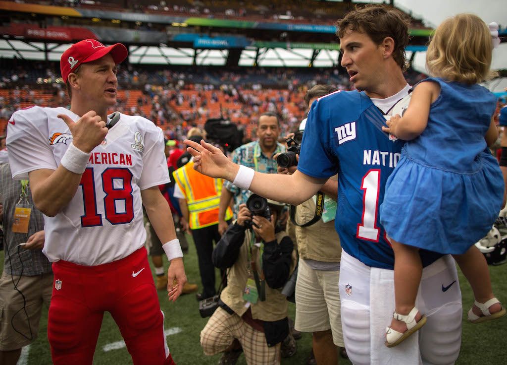 Peyton Manning and Eli Manning both know a thing or two about Pro Bowls | Kent Nishimura/Getty Images