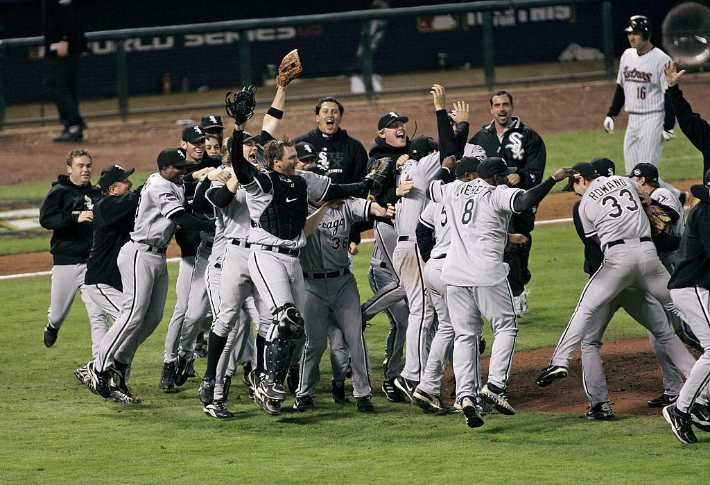 Members of the Chicago White Sox celebrate on the field after winning the 2005 World Series