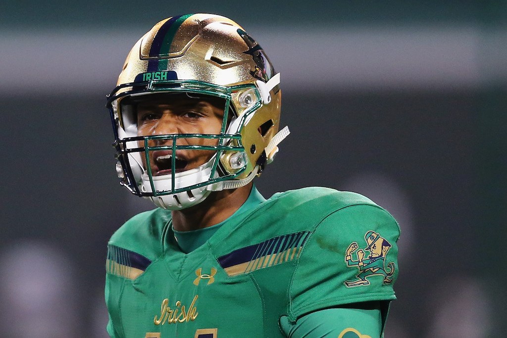 DeShone Kizer #14 of the Notre Dame Fighting Irish directs his team.