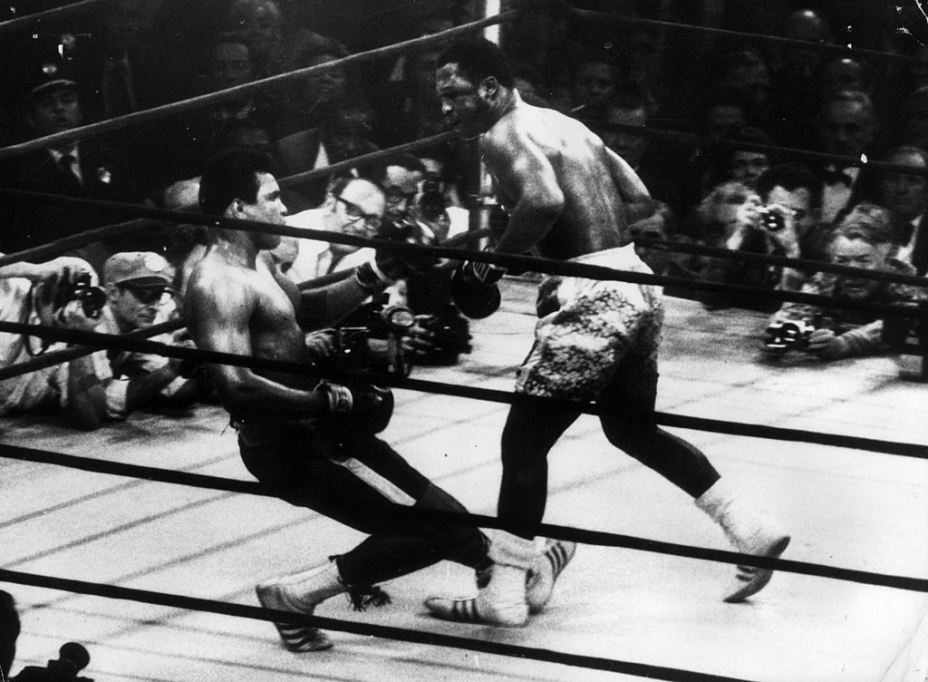In a title fight at Madison Square Gardens, New York, Muhammad Ali goes down in the 15th round