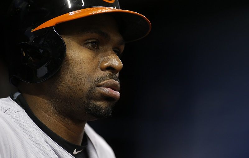 Michael Bourn of the Baltimore Orioles looks out of the dugout 