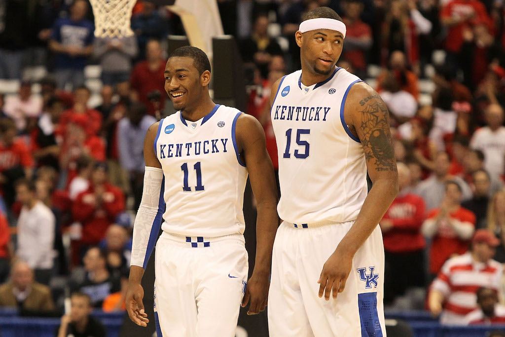 Former Kentucky teammates John Wall (L) and DeMarcus Cousins would be great together in the NBA | Jim McIsaac/Getty Images