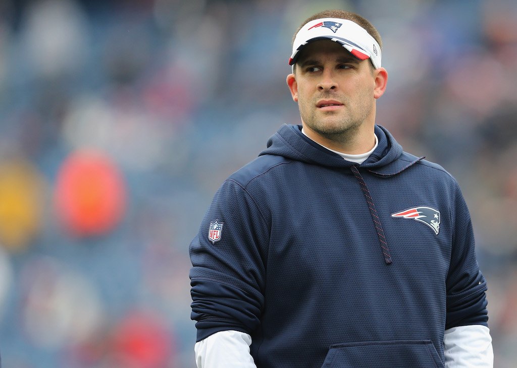 Offensive coordinator Josh McDaniels of the New England Patriots looks on before a game against the Buffalo Bills | Jim Rogash/Getty Images