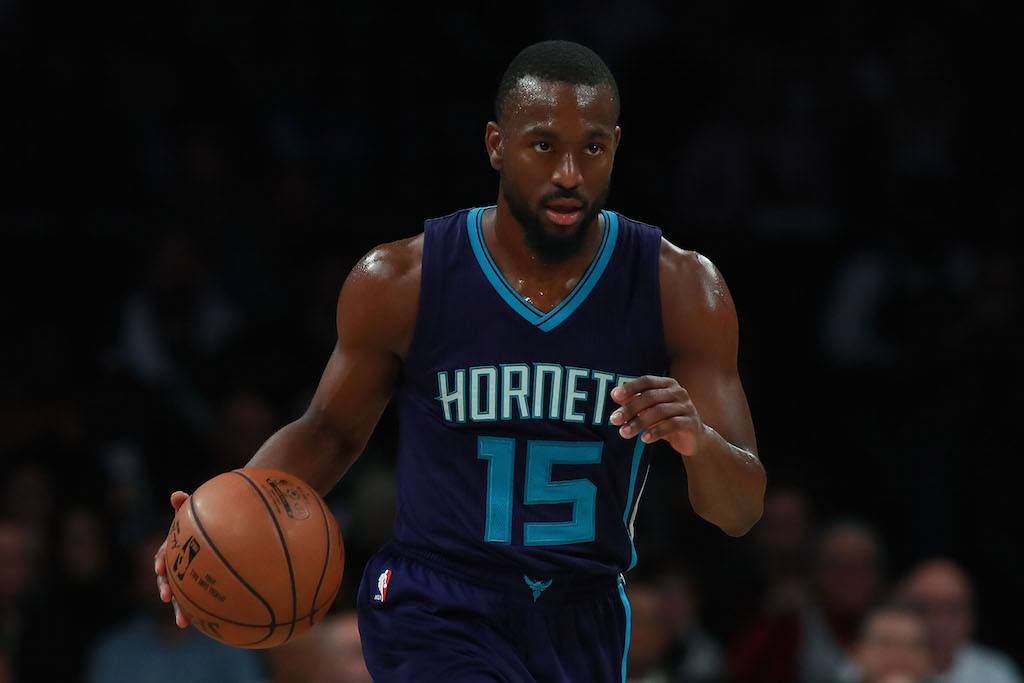 Kemba Walker looks to pass to a teammate | Michael Reaves/Getty Images