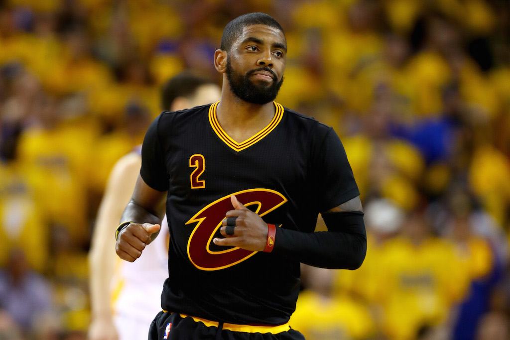 Kyrie Irving runs back down the court.