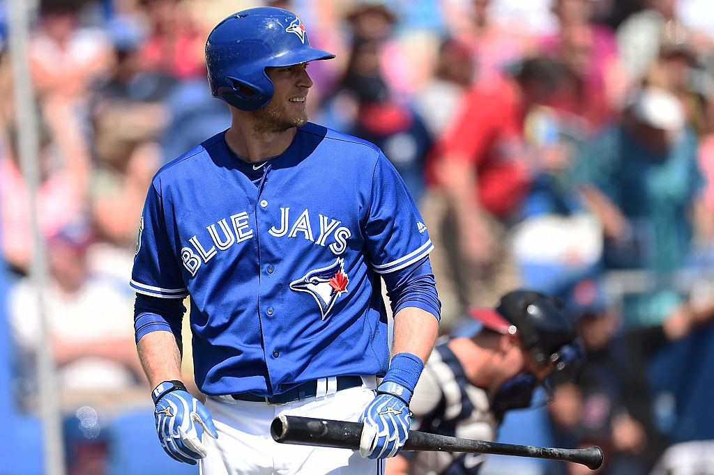Michael Saunders of the Toronto Blue Jays reacts to a strike out during a Spring Training game