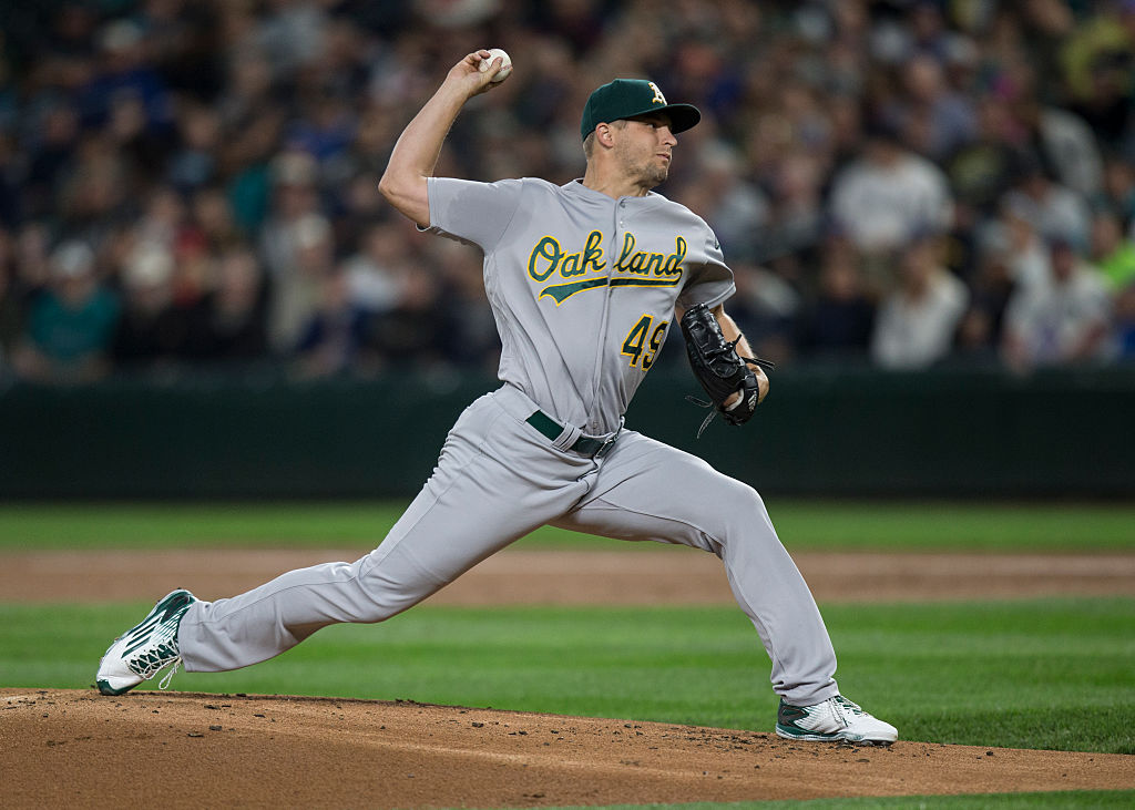 Kendall Graveman of the Oakland Athletics delivers a pitch. 