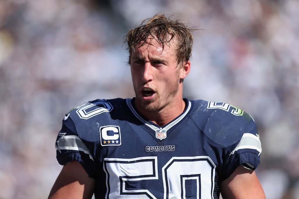 Sean Lee talks to the defense between plays.