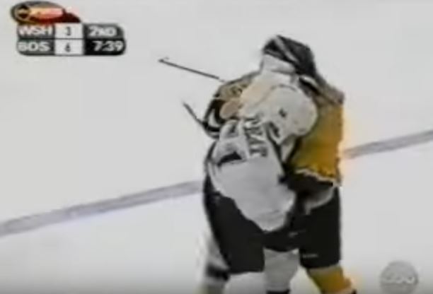 P.J. Stock and Stephen Peat fighting during a 2002 hockey game