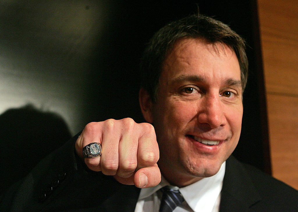 Cam Neely shows his ring during his induction into the Hockey Hall of Fame in 2005 | Bruce Bennett/Getty Images