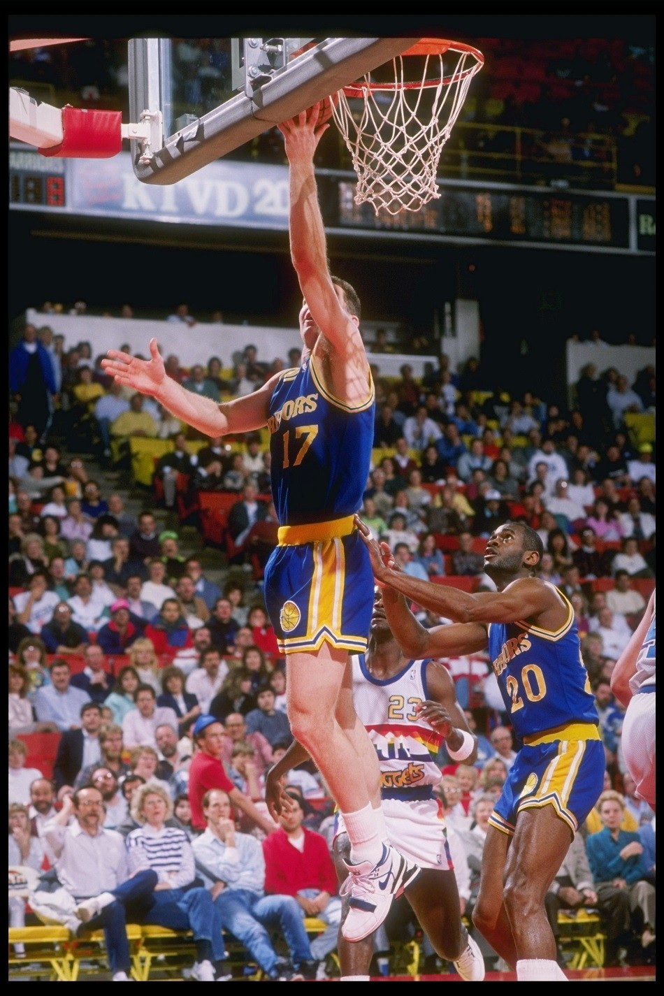 Chris Mullin of the Golden State Warriors lays up during a game