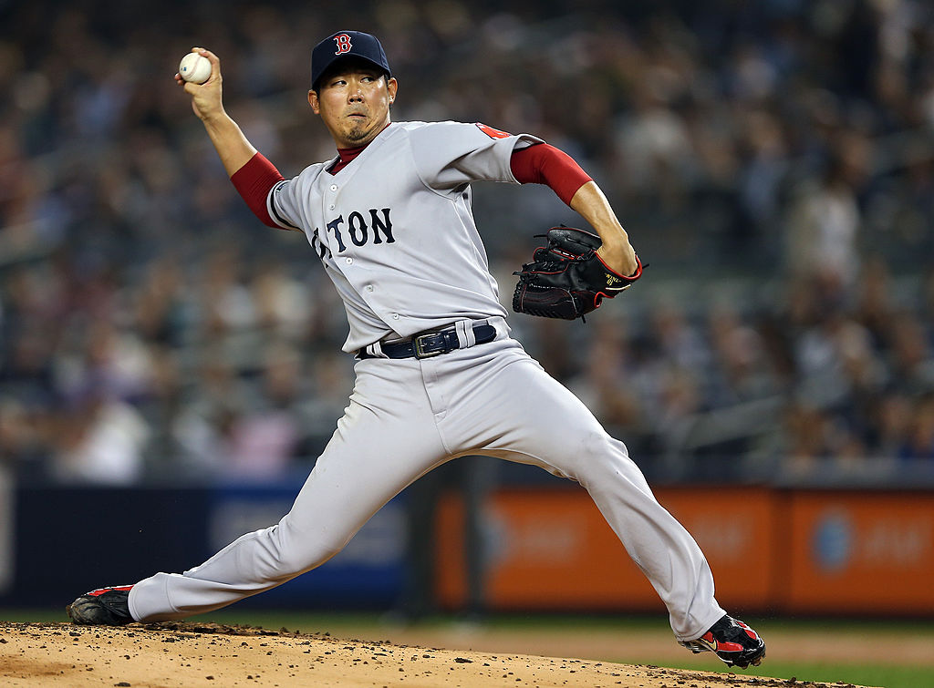 Daisuke Matsuzaka of the Boston Red Sox winding up to pitch