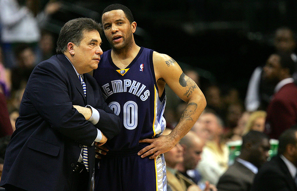 Head coach Tony Barone talks with Damon Stoudamire