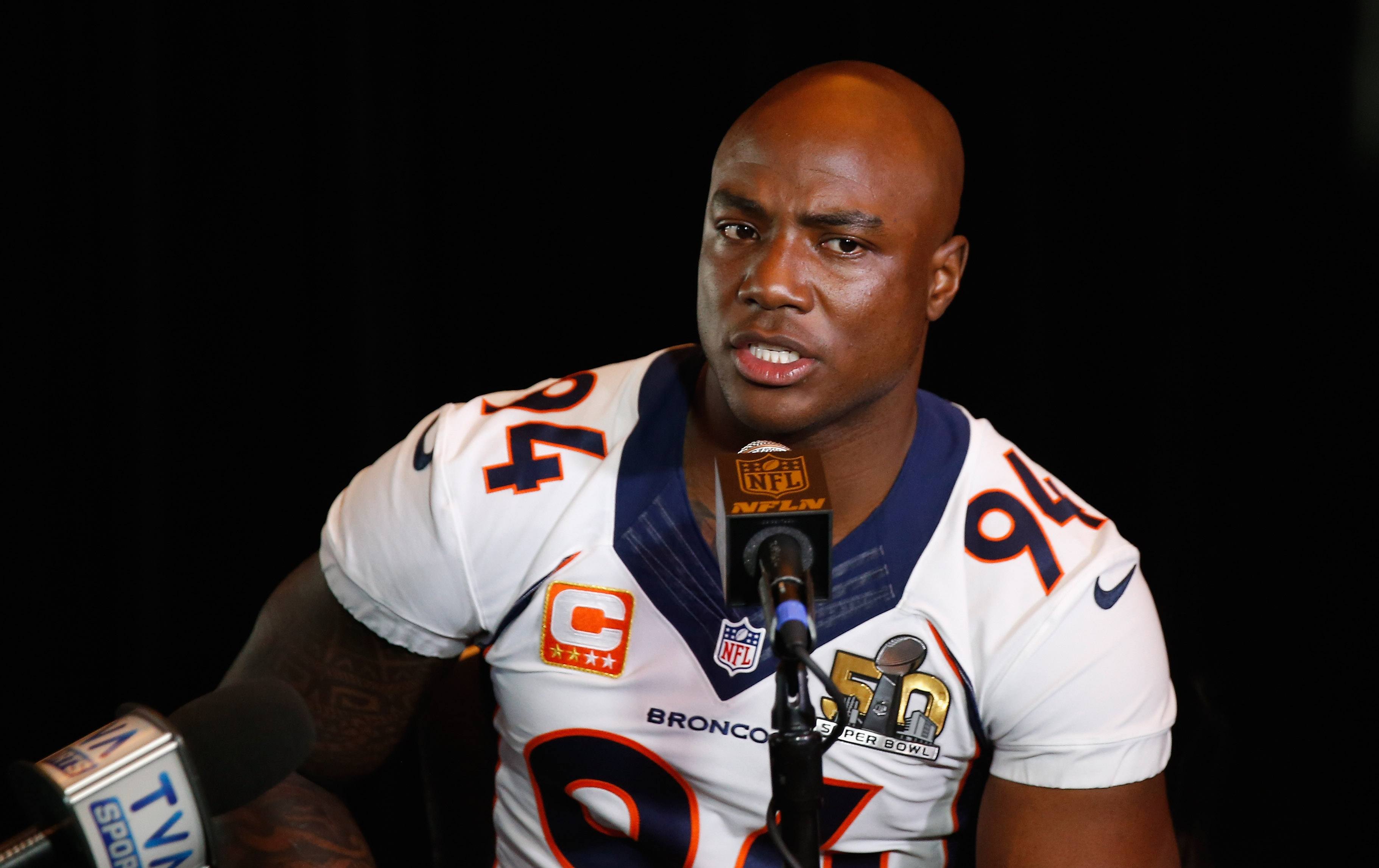 DeMarcus Ware speaks during a press conference.
