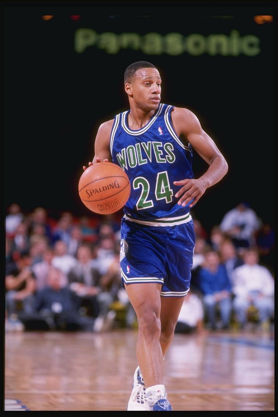 Guard Jerome (Pooh) Richardson of the Minnesota Timberwolves dribbles the ball down the court