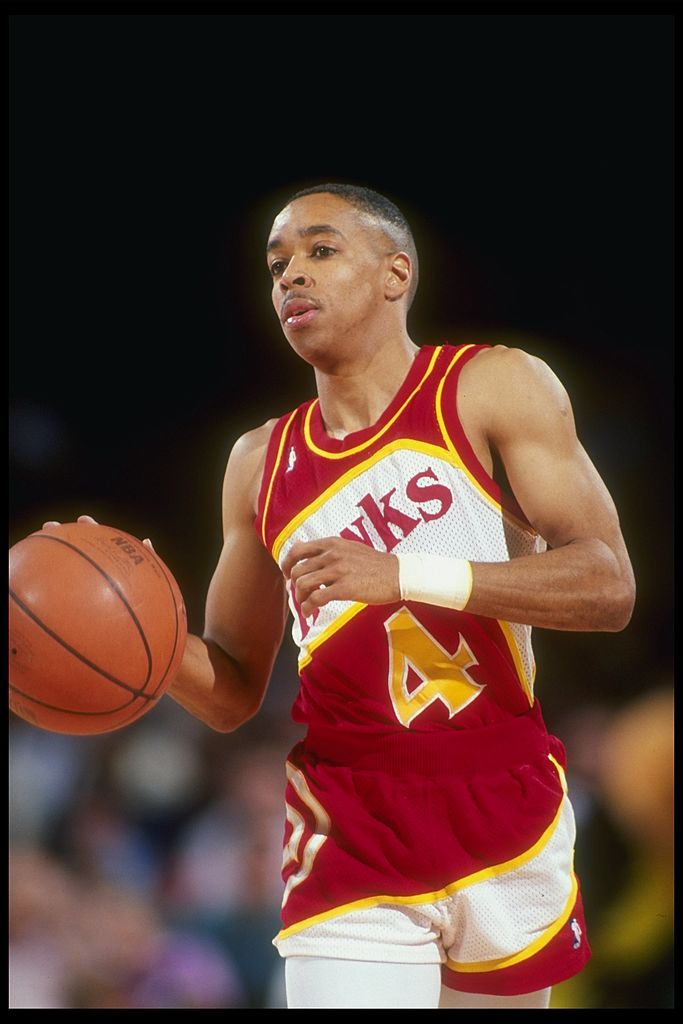 Point guard Anthony (Spud) Webb of the Atlanta Hawks takes the ball down the court
