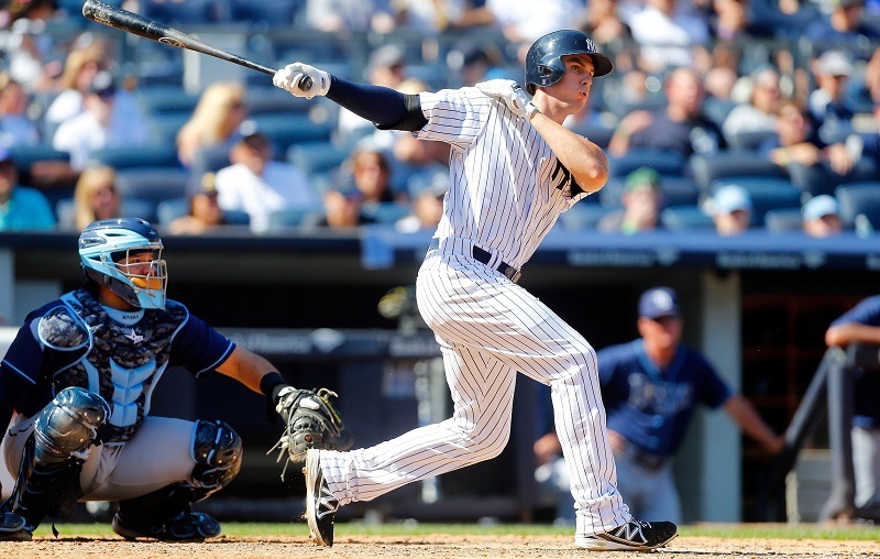 Greg Bird of the New York Yankees follows through on a sixth inning double against the Tampa Bay Rays.