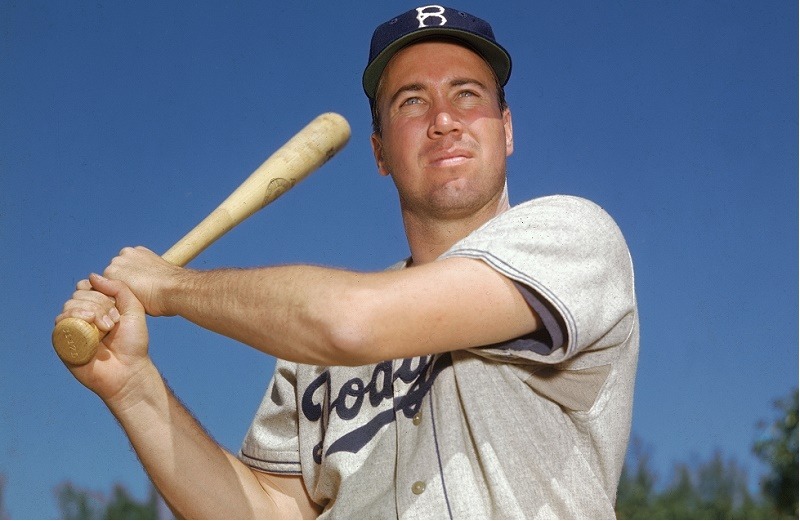 Portrait of Brooklyn Dodgers center fielder Duke Snider, a left-handed batter, swinging a bat, 1950s.