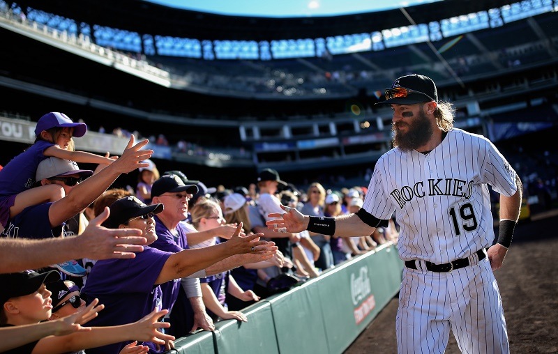 Charlie Blackmon of the Colorado Rockies shakes hands with fans after the final game of the 2016 season