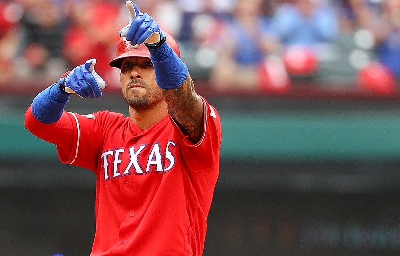 Ian Desmond of the Texas Rangers reacts after hitting a double against the Toronto Blue Jays in 2016