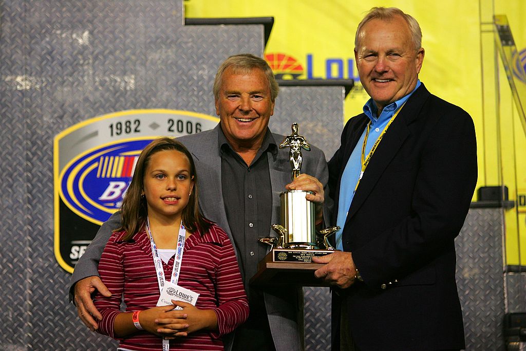 Dick Trickle (C) receives the Bobby Isaac Memorial Award from Humpy Wheeler (R)