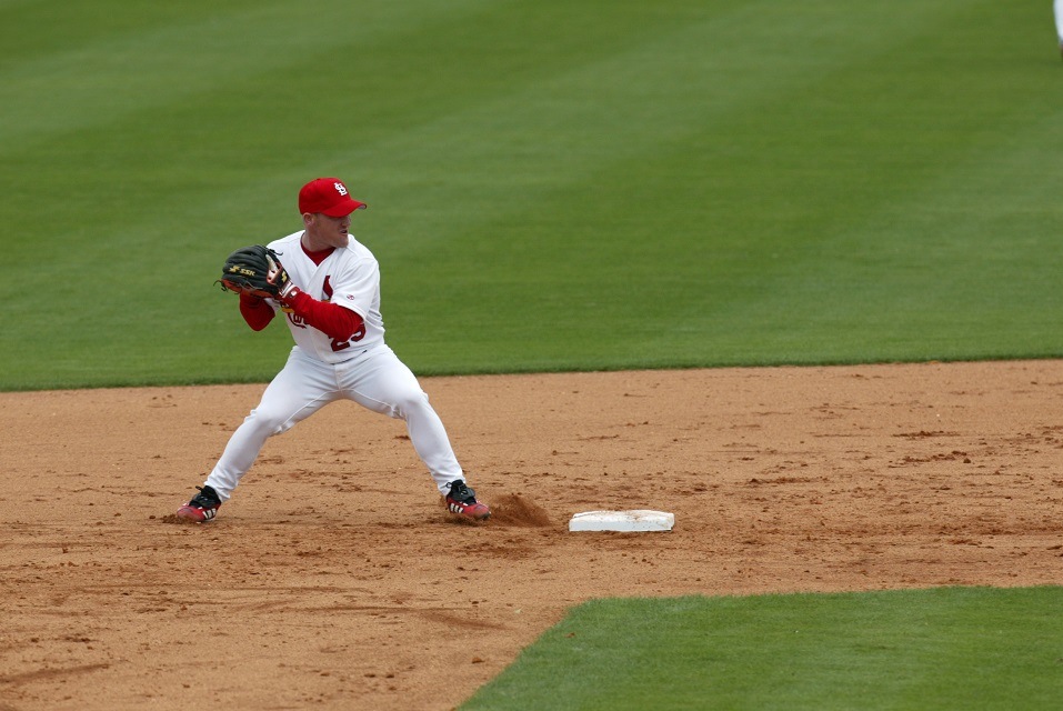 Stubby Clapp of the St.Louis Cardinals gets up to throw the ball