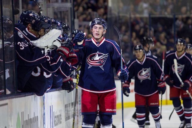 Columbus Blue Jackets Defenceman Zach Werenski celebrates with the Columbus Blue Jackets bench after scoring a goal against the Chicago Blackhawks | Michael Griggs/Icon Sportswire via Getty Images