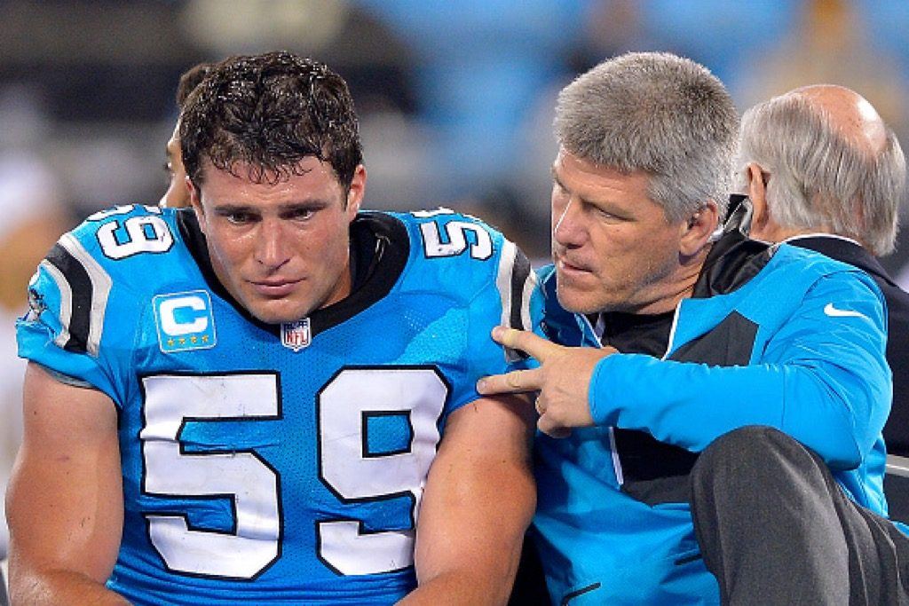 Luke Kuechly of the Carolina Panthers is carried off the field after an injury against the New Orleans Saints in the fourth quarter | Grant Halverson/Getty Images