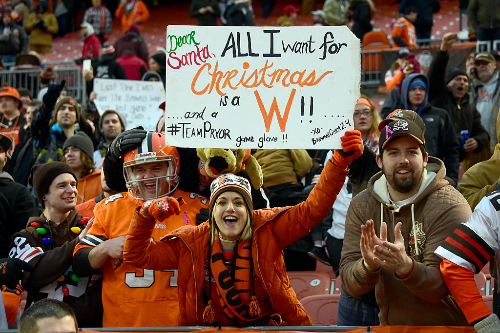 Cleveland Browns fans celebrates after defeating the San Diego Chargers Cleveland Browns fans celebrates after defeating the San Diego Chargers