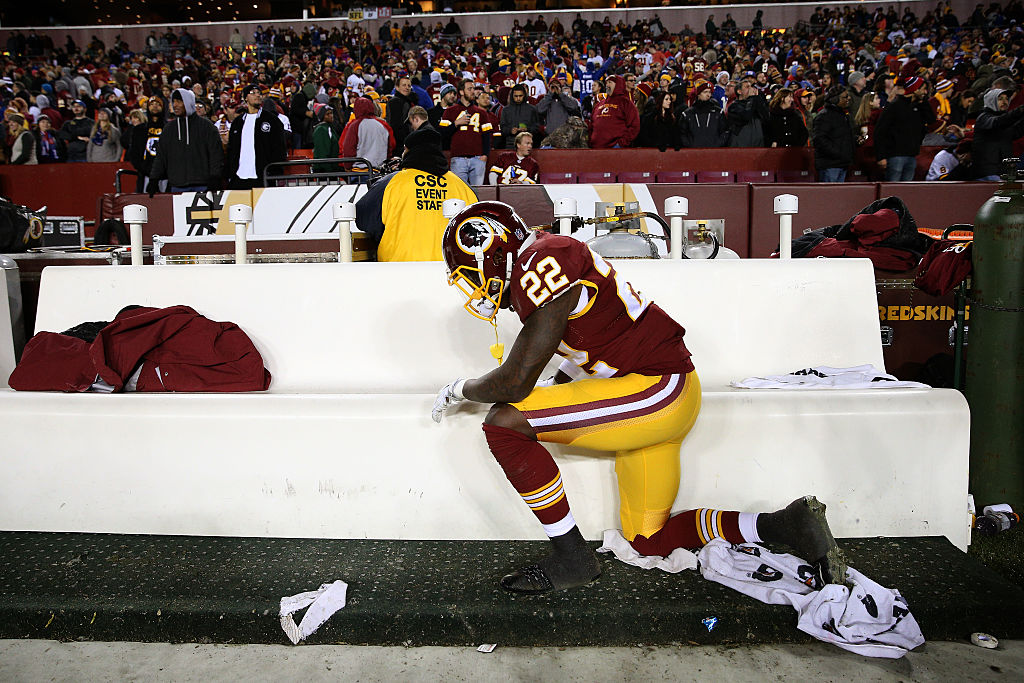 Cornerback Deshazor Everett of the Washington Redskins takes a knee.