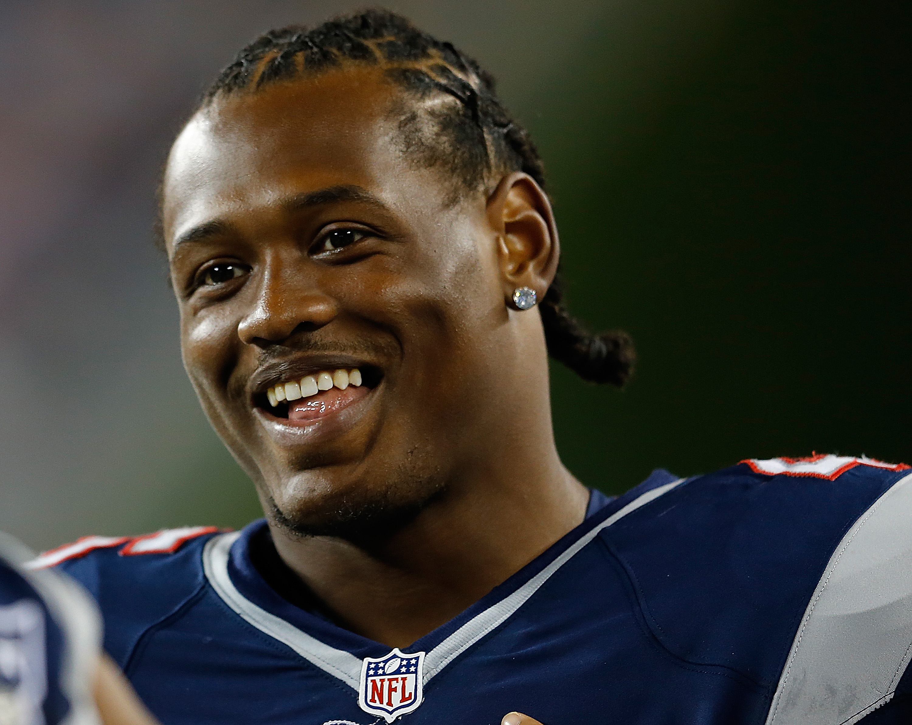 Dont'a Hightower of the New England Patriots watches the action from the sidelines.